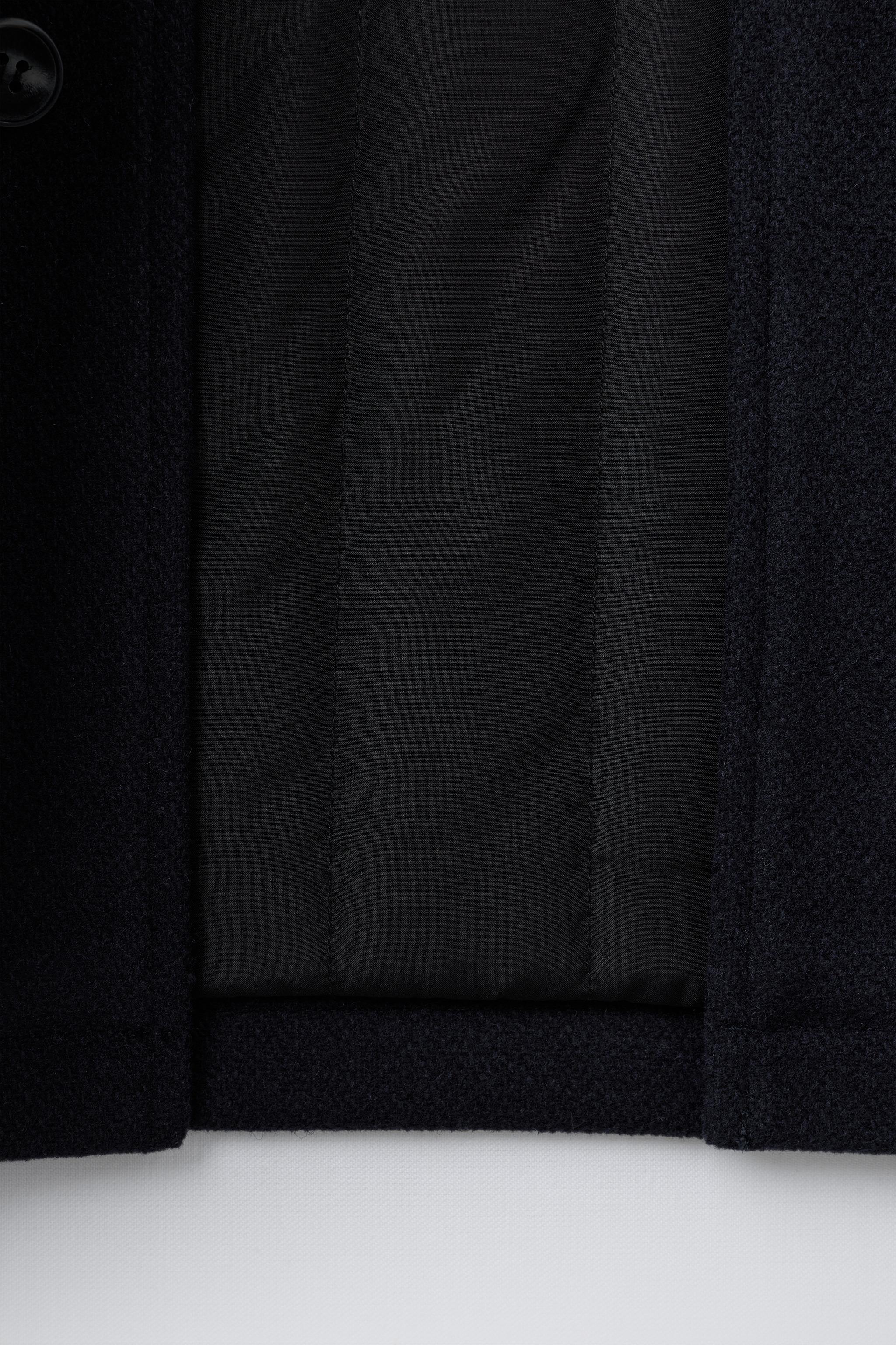 MANTEAU EN DRAP À CAPUCHE